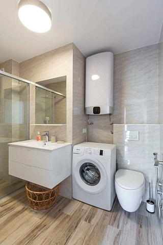 Eine gemütliche und moderne 53 m² große Wohnung in Bečići — photo 15